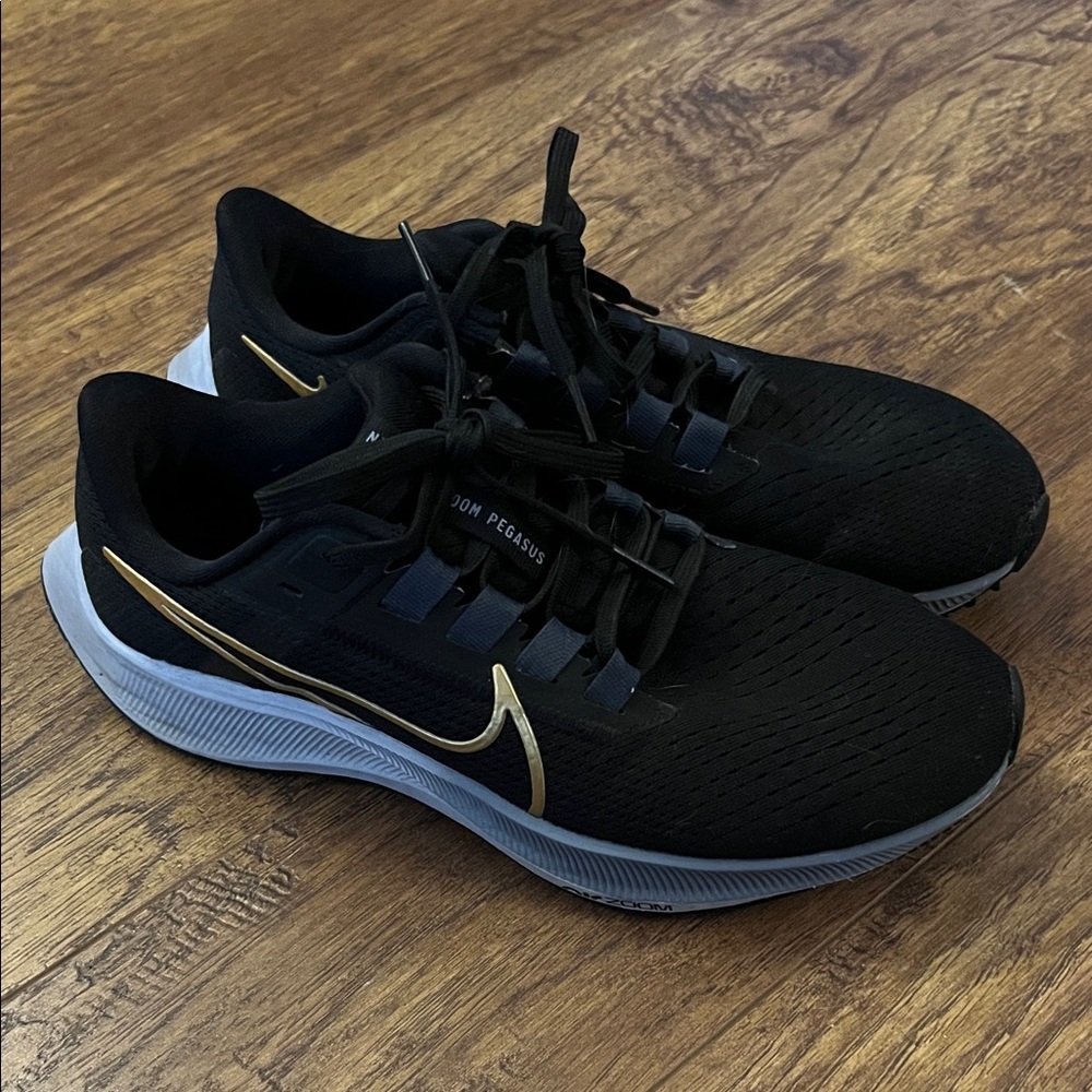 Nike Women’s Black and Gold Athletic Shoes